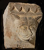 Modillon figurant une tête de félin (musée Sainte-Croix de Poitiers)